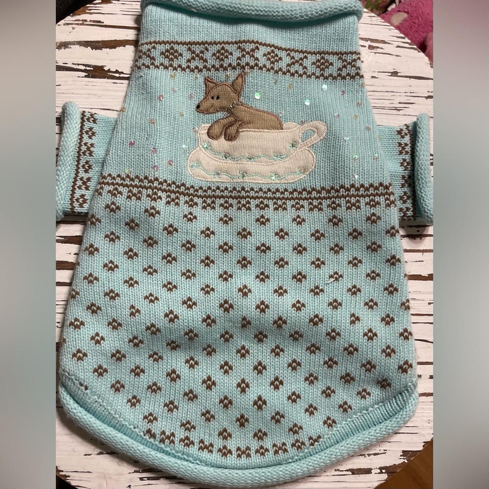 Cute Blue Dog Sweater with Dog in a Cup with beads Design.
Medium